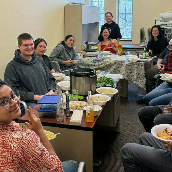 Photo of the lab members at tea, celebrating the Chinese New Year, when the boss is away