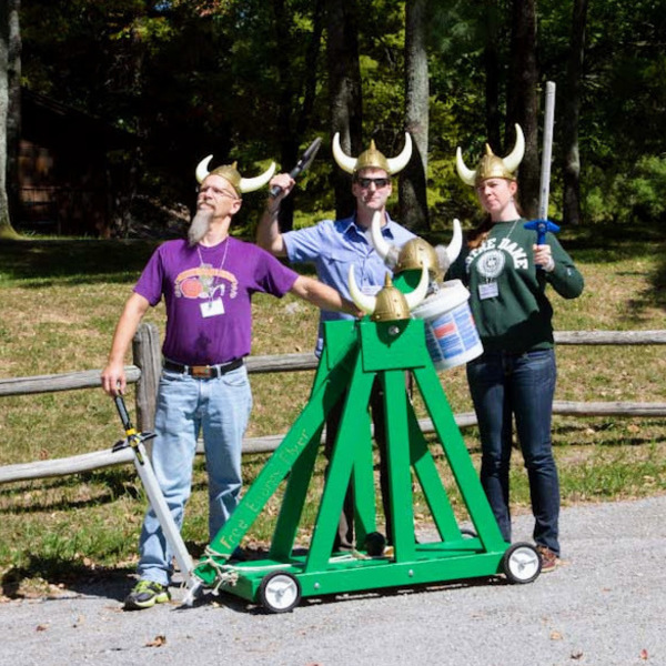 Three lab members dressed as viking warriors in 2012