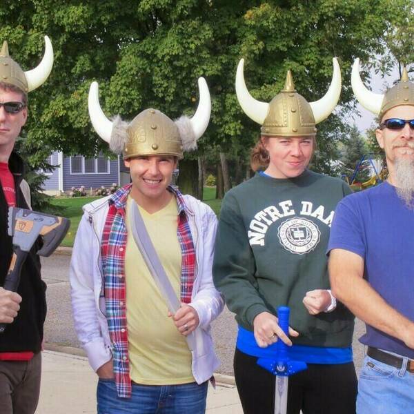 Four lab members dressed as viking warriors in 2012