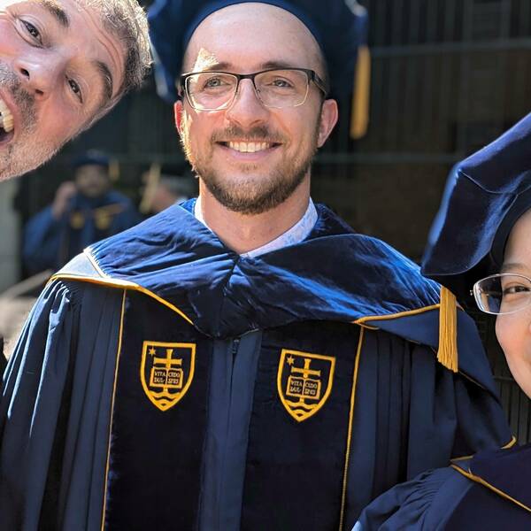 Photo of Brian Baker, Aaron Rosenberg, and Jiaqi Ma at the 2024 Graduate School Commencement